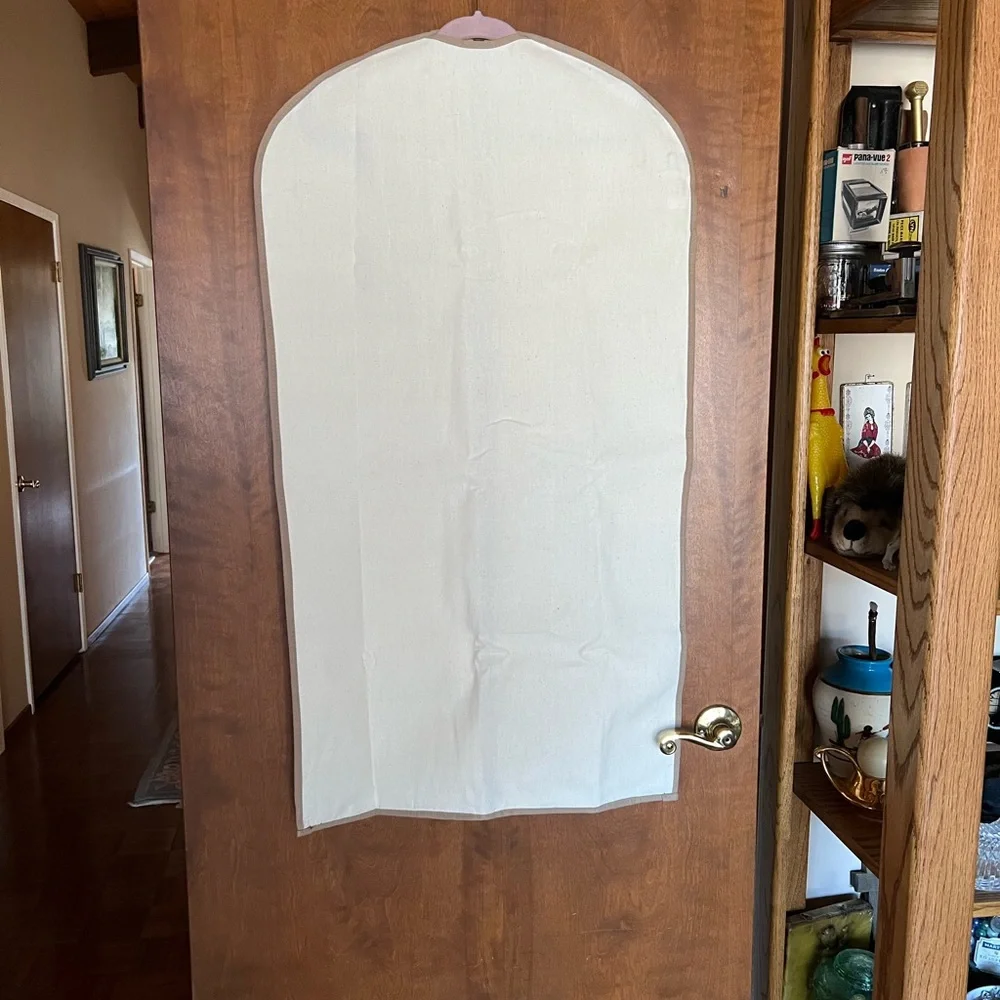 Elegant Cream Garment Bag for Door Storage